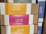 several boxes of wine are stacked on top of each other in a box