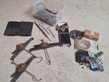 a lot of tools that are laying out on the floor