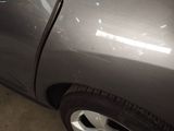 a close up of a car ' s door handle and the door handle is missing
