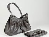 leather handbag and wallet on a white background