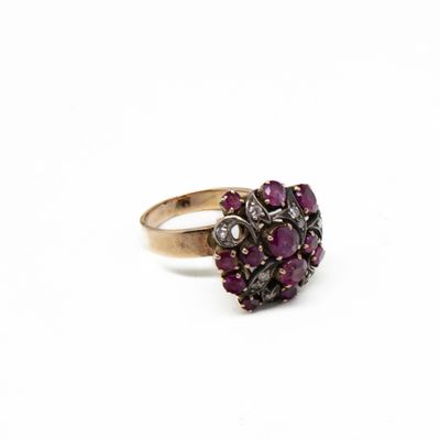 a close up of a ring on a white surface