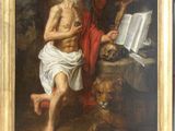 un vieux tableau représentant un homme en train de lire un livre, avec un chien à ses côtés