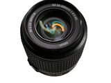a camera lens that is sitting on top of a table
