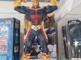 a statue of a man that is on display in a glass case