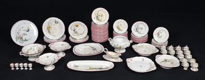 many different types of porcelain dishes and dishes on the table