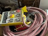 a box with a bunch of hoses and a box with a bunch of wires on it