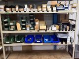 many boxes and boxes on a shelf in a warehouse