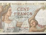 an old french bank note with a woman and child on it