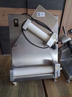 a machine that is sitting on top of a wooden table