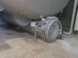 an image of a large tank with a hose attached to it ' s side