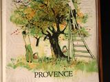a picture of a book with a picture of a tree and a ladder