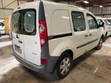 a white van that is parked in a garage
