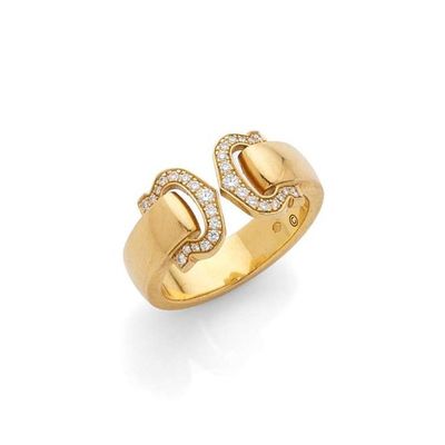 a gold and diamond ring, by cartier