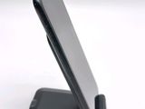 a close up of a cell phone on a stand