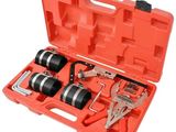 une image représentant un ensemble d'outils dans un coffret, sur fond blanc