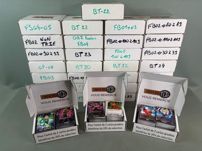 several boxes of games are stacked on top of each other on a table