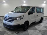 the white van is parked on a checkered floor in a room