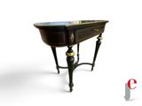 a small table that has a marble top on it