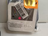 a plastic bag with a label on it sitting on a table