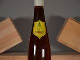 a bottle of beer that is sitting on a table