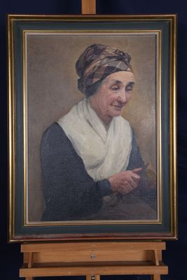 portrait d'une femme coiffée d'un turban, devant un chevalet de peinture