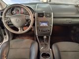a picture of a car dashboard with a steering wheel and dashboard controls