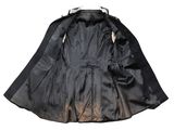 the back of a black jacket with a zipper on it