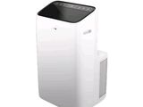 a white air conditioner sitting on top of a white table