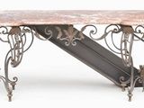 a table with a marble top on a white background