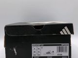a black box with a pair of shoes in it