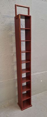 Meuble colonne en laque rouge style chinois.