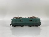 an image of a green train car on a white surface