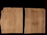 two pieces of wood are shown against a black background