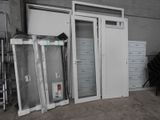 a room with a bunch of doors and a chair
