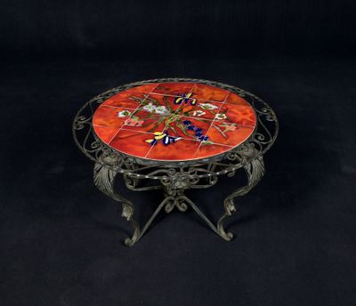 an image of a table with a red glass top on a black background