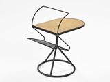 an image of a black metal stool with a wooden seat