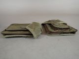 two wallets that are sitting next to each other on a table
