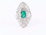 an emerald and diamond ring