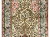 an antique persian rug with a floral design