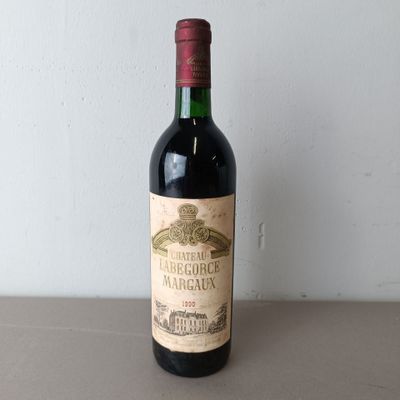 a bottle of wine that is sitting on a table