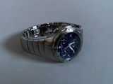 a close up of a wrist watch on a table