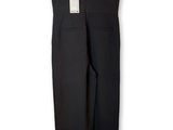 a black jumpsuit on a hanger on a white background