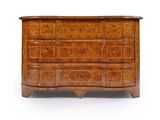 an antique chest of drawers with carved drawers and drawers