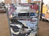 a cart with a lot of items in it in a warehouse