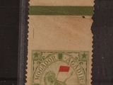 une image représentant un timbre sur lequel figure un homme tenant un drapeau