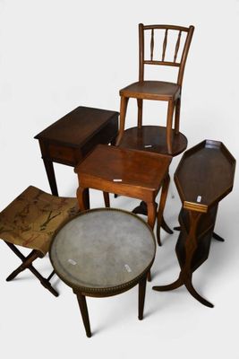 several pieces of furniture including a chair, table, and stool