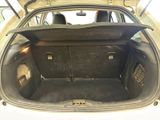 a trunk of a car with the back door open