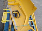 a pile of pallets and a bucket on a pallet