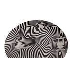 black and white oval plate with a zebra print design on it