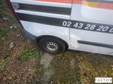a van that is parked on the side of the road